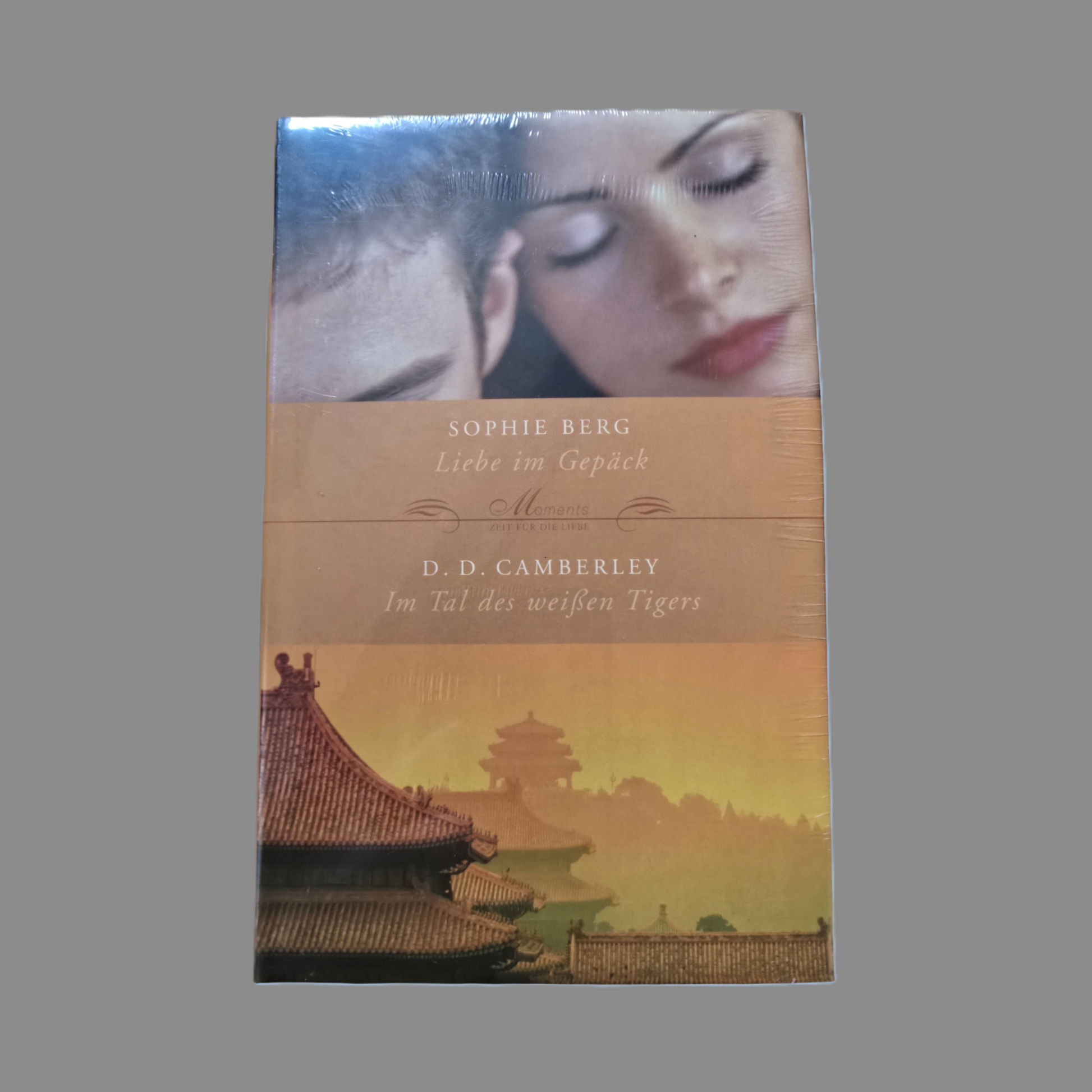 Buch mit 2 Romanen: Liebe im Gebäck / Im Tal des weißen Tigers OVP